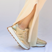 Hope Womens Sneaker in gold with gold wing